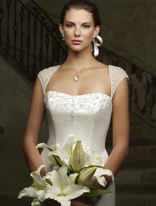 Embroidered Satin Wedding Dress Flattering Neckline Fit and flare Styling Includes Delivery